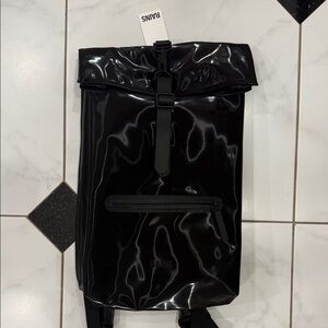 Rains Black Gloss Rolltop Backpack